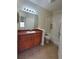 Clean bathroom with a vanity, tile floors, and a shower-tub combination at 8137 Claire Ann Dr # 203, Orlando, FL 32825