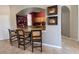 Charming breakfast bar with seating, perfect for casual dining and entertaining guests at 8137 Claire Ann Dr # 203, Orlando, FL 32825
