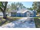 A charming single-story home with a covered parking area at 1006 San Domingo Rd, Orlando, FL 32808