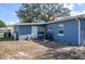 Back of the house and outdoor utilities at 1006 San Domingo Rd, Orlando, FL 32808