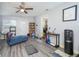 Cozy living room with plenty of seating, ceiling fan, and a view into the dining area at 1006 San Domingo Rd, Orlando, FL 32808