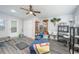 Comfortable living room with gray walls, stylish furnishings, and wood-look flooring at 1006 San Domingo Rd, Orlando, FL 32808