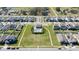 Aerial view of neighborhood including pool area, houses, and green spaces at 1097 Hendon Loop, Davenport, FL 33837