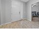 Inviting entryway with tile floors, neutral walls, and an open view into the bedroom at 1097 Hendon Loop, Davenport, FL 33837