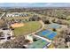 Overhead view of the community recreation center, baseball field, tennis courts and basketball courts at 1238 James Ln, Kissimmee, FL 34759