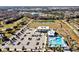 Overhead view of the community recreation center including the pool, parking lot, and sports fields at 1238 James Ln, Kissimmee, FL 34759