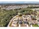This home is conveniently located near a wooded area, providing a mix of suburban and natural landscapes at 1238 James Ln, Kissimmee, FL 34759