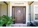 A covered front porch welcomes visitors with seasonal decor at 1238 James Ln, Kissimmee, FL 34759