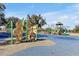 Expansive playground area featuring climbing frames and a tower, offering fun for all ages at 1238 James Ln, Kissimmee, FL 34759