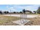 Outdoor recreational area with a beach volleyball court and bike rack at 1238 James Ln, Kissimmee, FL 34759