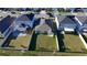 Aerial view of home with fenced yard, patio and lake view at 1524 Venice Ln, Davenport, FL 33896