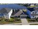 Aerial view of home with lake view and fenced yard at 1524 Venice Ln, Davenport, FL 33896