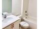 This bathroom has a shower and tub combination with a new looking sink and vanity at 1613 Pelican Dr, Davenport, FL 33896