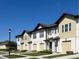 Modern townhomes boast two-story elevations, attached garages and professional landscaping at 1613 Pelican Dr, Davenport, FL 33896
