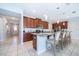 Spacious kitchen with granite countertops, stainless appliances and breakfast bar with seating at 1737 Caribbean View Ter, Kissimmee, FL 34747