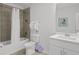 Clean bathroom with a shower/tub combo, and a modern sink vanity at 194 Golden Noble St, Davenport, FL 33897