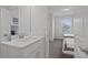 Tastefully designed bathroom with vanity and a partial view into a bedroom at 194 Golden Noble St, Davenport, FL 33897