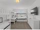 Bedroom with bunk beds and dresser, illuminated by natural light and a ceiling light at 194 Golden Noble St, Davenport, FL 33897