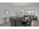 Open-concept dining area with a large dining table and ample seating at 194 Golden Noble St, Davenport, FL 33897