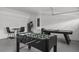 Spacious game room with foosball and air hockey table, offering entertainment for the whole Gathering at 194 Golden Noble St, Davenport, FL 33897