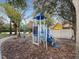Community playground with a slide and climbing structure, perfect for recreation at 19934 Villa Isle # 107, Orlando, FL 32821