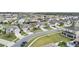 Well-maintained residential street with mature trees, sidewalks, and lush green lawns at 2559 Eagle Bay Blvd, Kissimmee, FL 34743