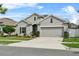 Beautiful single Gathering home with a well manicured yard and two car garage at 2559 Eagle Bay Blvd, Kissimmee, FL 34743