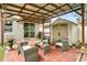 Covered patio with outdoor seating area and storage shed at 2559 Eagle Bay Blvd, Kissimmee, FL 34743