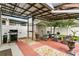Outdoor living area with covered patio, storage shed, and barbecue grill at 2559 Eagle Bay Blvd, Kissimmee, FL 34743