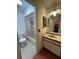 Bathroom featuring a shower-tub combo, white vanity with sink, and updated fixtures at 2900 S Semoran Blvd # S, Orlando, FL 32822