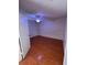 This bedroom features a ceiling fan, tile floors, and a closet, making it quite comfortable at 2900 S Semoran Blvd # S, Orlando, FL 32822
