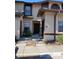 Charming townhome with a well-maintained facade and inviting entrance at 2900 S Semoran Blvd # S, Orlando, FL 32822