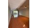 Spacious living room provides tiled floors, ceiling fan, and sliding glass door to patio at 2900 S Semoran Blvd # S, Orlando, FL 32822