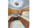 Bright kitchen boasts white countertops and stainless steel appliances at 305 S Palm Ave, Kissimmee, FL 34741