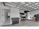 Spacious garage with laundry hookups, sink, mini-fridge, and access to a living space at 33 Perch Dr, Kissimmee, FL 34759