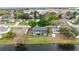Aerial view of home features a backyard pool and community lake access at 3619 Willow Lake Ct, St Cloud, FL 34769