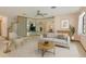 Cozy living room featuring neutral decor, modern furniture, and natural light at 3619 Willow Lake Ct, St Cloud, FL 34769