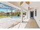 Screened-in pool area with a covered patio, view of the pool and neighborhood at 3619 Willow Lake Ct, St Cloud, FL 34769