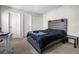 This cozy bedroom features neutral walls and a queen-sized bed, perfect for relaxation at 3987 Meandering Bay Dr, Apopka, FL 32712