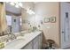 Bathroom featuring a double sink vanity with granite countertop at 4311 Via Cavour Ct, Kissimmee, FL 34759
