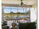 Inviting lanai with brick flooring and peaceful lake views for outdoor enjoyment at 4311 Via Cavour Ct, Kissimmee, FL 34759