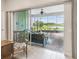 View from living room of screened lanai, complete with brick floor and outdoor dining area at 4311 Via Cavour Ct, Kissimmee, FL 34759