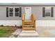 Charming single-Gathering home with vinyl siding, steps to the front door, and manicured front yard at 4626 Bunting Ave, Orlando, FL 32812