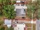 Overhead view of the property with a garage and screened in patio, outlined in red at 528 S 8Th St, Lake Wales, FL 33853