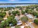 Beautiful aerial view of the home with surrounding green space and lake in the distance at 528 S 8Th St, Lake Wales, FL 33853