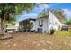 Serene backyard featuring a screened-in porch, offering a relaxing outdoor retreat at 528 S 8Th St, Lake Wales, FL 33853