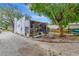 Spacious backyard with a charming screened-in porch, ideal for outdoor entertaining and relaxation at 528 S 8Th St, Lake Wales, FL 33853