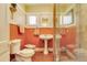 Charming bathroom with terracotta tile, a modern shower, and pedestal sink that blends vintage style at 528 S 8Th St, Lake Wales, FL 33853