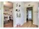 Hallway with storage cabinets providing access to the laundry room and dining room at 528 S 8Th St, Lake Wales, FL 33853