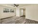 Spacious bedroom featuring new wood flooring and a modern ceiling fan at 628 Eastwood Ct, Altamonte Springs, FL 32714